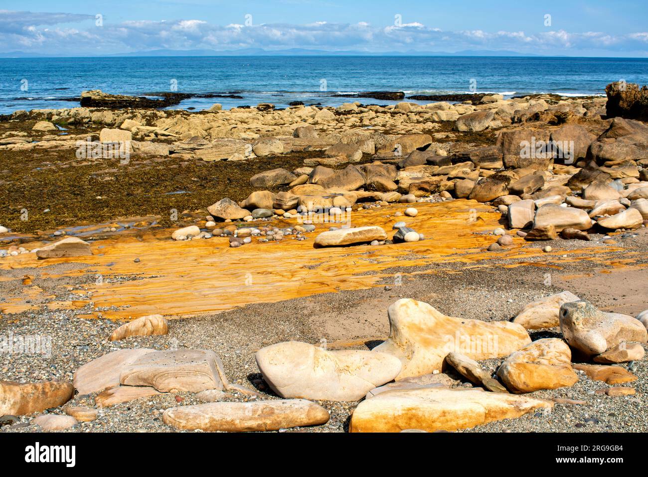 Hopeman Beaches orange rocks consisting of Hopeman Sandstone (Permo ...
