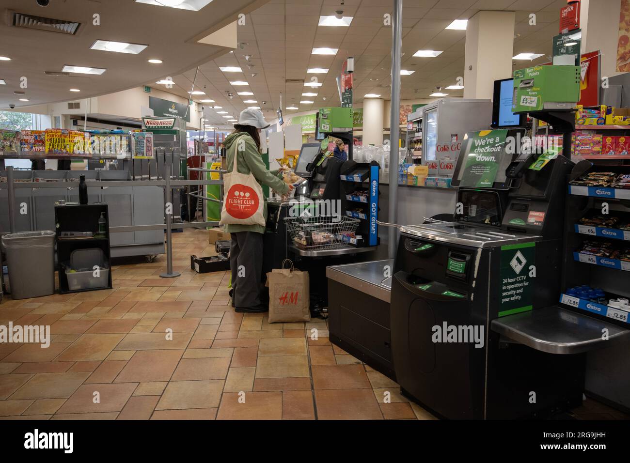 A student food shopping in Morrisons food store, London, England, United Kingdom Stock Photo