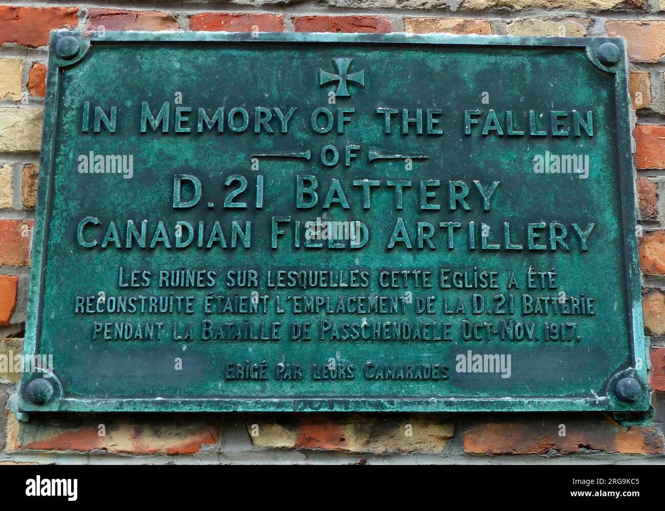 The plaque is on the outside wall of the re-built church. The battery was stationed in Zonnebeke during Third Ypres, October-November 1917. Excavations between 1987 and 1989 uncovered the remains of an old Abbey and a 4 metres deep Australian dug-out. Stock Photo