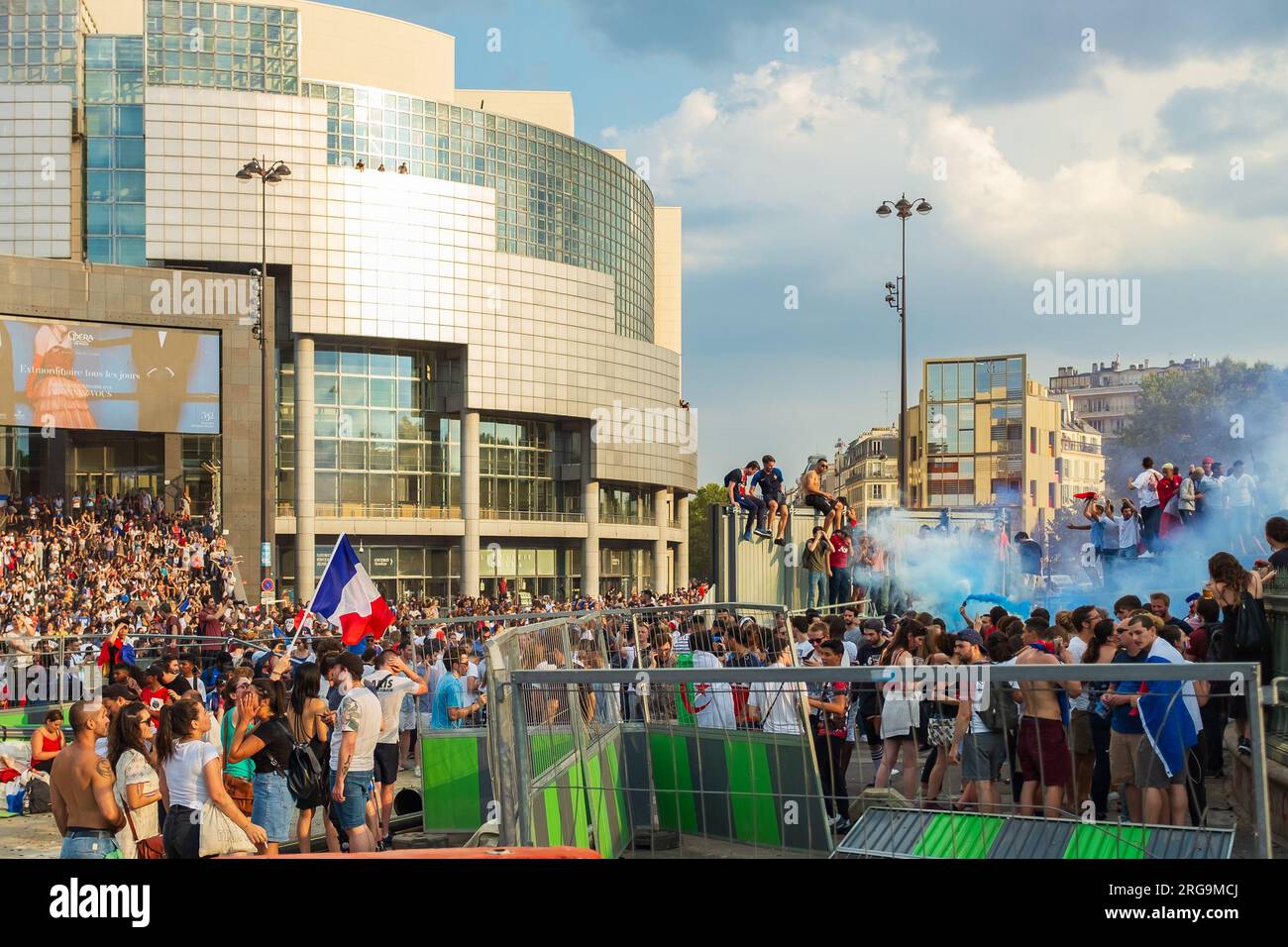 Paris, France, 2018. Soccer fans on the steps of the Opéra Bastille and
