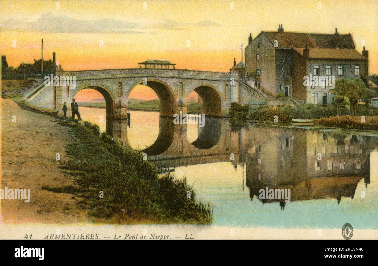 Armentieres - Le Pont de Nieppe. During World War I, in April 1918, German forces shelled Armentieres with mustard gas. British troops were forced to evacuate the area but German troops could not enter the commune for two weeks because of the heavy contamination. Witnesses to the bombardment stated that the shelling was so heavy that liquid mustard ran in the streets. This beautiful 18th century three span bridge was also destroyed during the war. Stock Photo