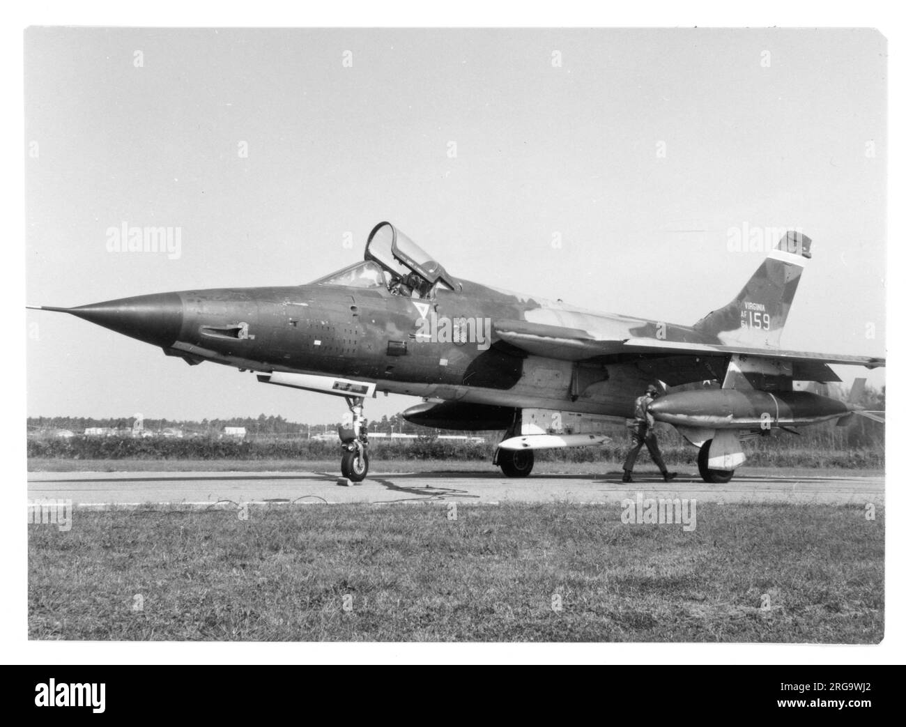 Virginia Air National Guard - Republic F-105D Thunderchief 61-0159 (msn D354) of the 149th Tactical Fighter Squadron seen with a 4-round Zuni practice rocket launcher on the bomb door pylon.. In February 1970 '0159' was active with the 354th Tactical Fighter Squadron and named 'Honey Pot II', completing 600 South-East Asia missions, credited with one MiG kill. Now on display at Davis Monthan AFB, Arizona, painted as 62-4284. Stock Photo