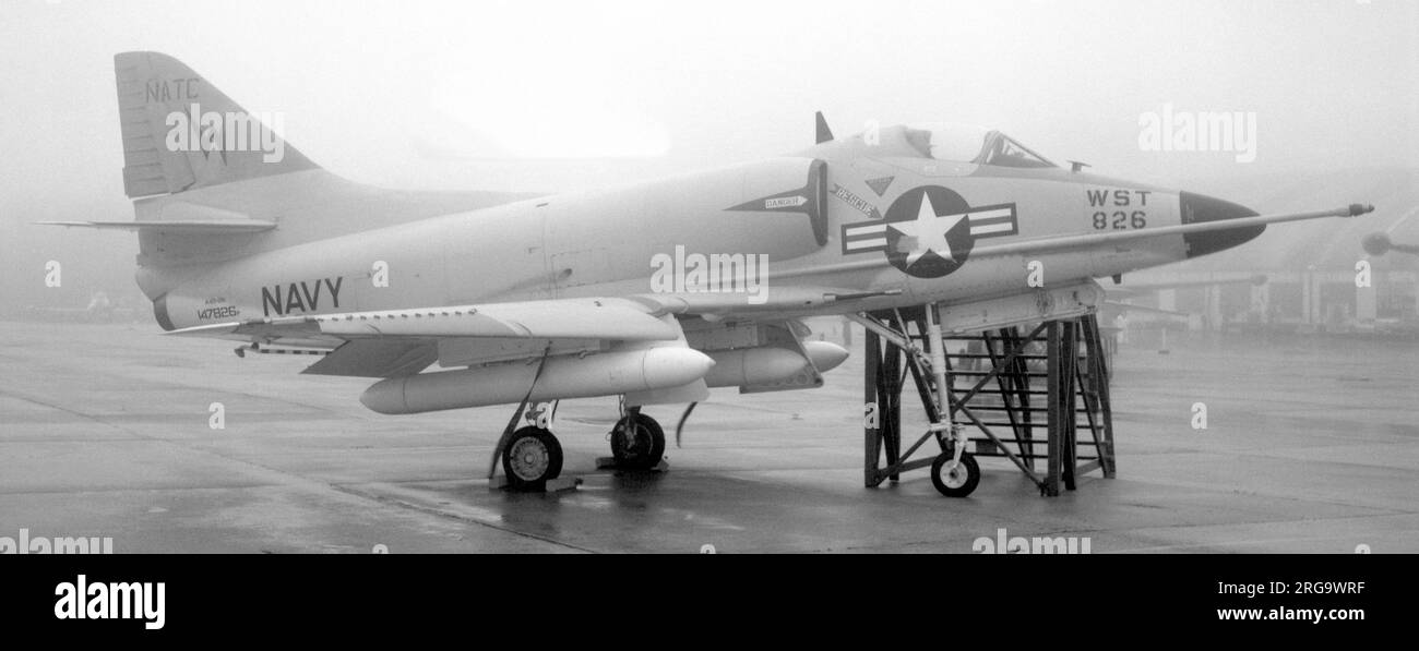 United States Navy - Douglas A4D-2N Skyhawk 147826 (msn 12590, unit code 'WST', call-sign '826') of the Naval Air Testing Centre at a very foggy Patuxent River Naval Air Station. 1962 re-designated A-4CMay 1971: Put into storage at the AMARC bone yard. December 1983: Sent to be a target on the Holloman Range, NM. Stock Photo