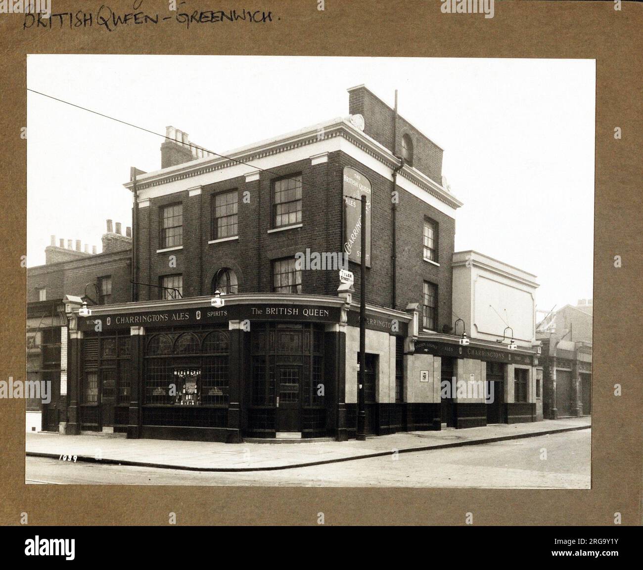 Photograph of British Queen PH, Greenwich, London. The main side of the print (shown here) depicts: Corner on view of the pub.  The back of the print (available on request) details: Nothing for the British Queen, Greenwich, London SE10 9ER. As of July 2018 . Became Rick's Bar now brach of Ladbrokes Stock Photo