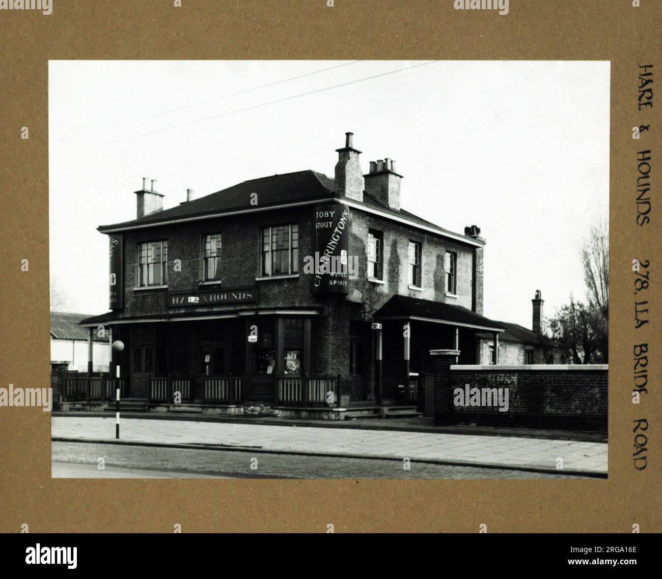 Photograph of Hare & Hounds PH, Lea Bridge, London. The main side of the print (shown here) depicts: Right face on view of the pub.  The back of the print (available on request) details: Nothing for the Hare & Hounds, Lea Bridge, London E10 7LD. As of July 2018 . Enterprise Inns Stock Photo