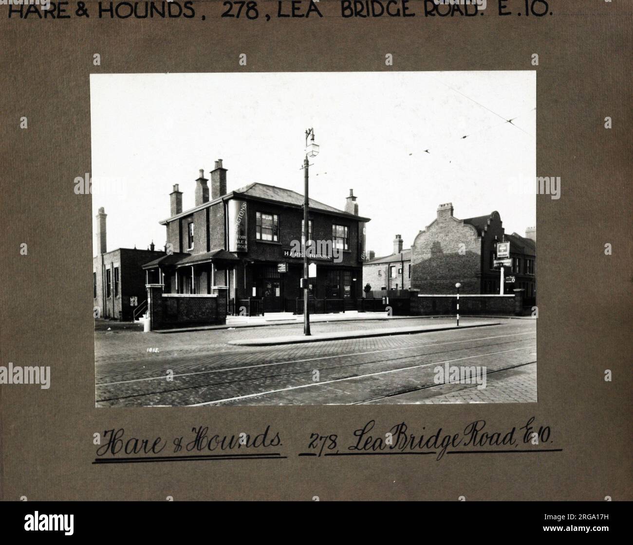 Photograph of Hare & Hounds PH, Lea Bridge, London. The main side of the print (shown here) depicts: Left Face on view of the pub.  The back of the print (available on request) details: Nothing for the Hare & Hounds, Lea Bridge, London E10 7LD. As of July 2018 . Enterprise Inns Stock Photo