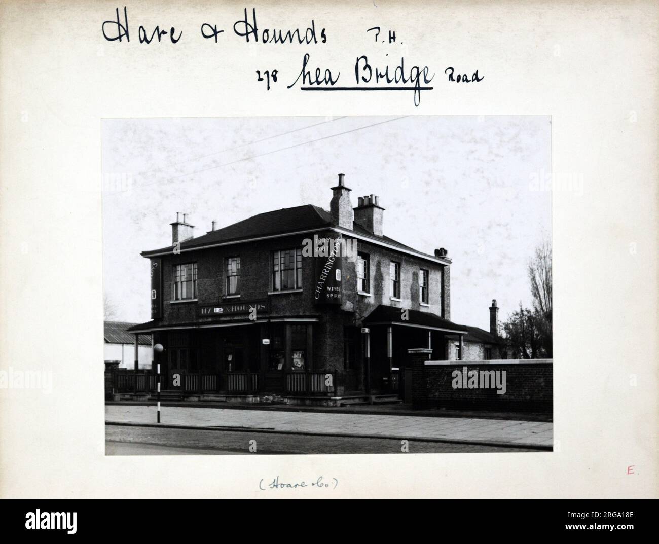 Photograph of Hare & Hounds PH, Lea Bridge, London. The main side of the print (shown here) depicts: Right face on view of the pub.  The back of the print (available on request) details: Trading Record 1938 . 1961 for the Hare & Hounds, Lea Bridge, London E10 7LD. As of July 2018 . Enterprise Inns Stock Photo