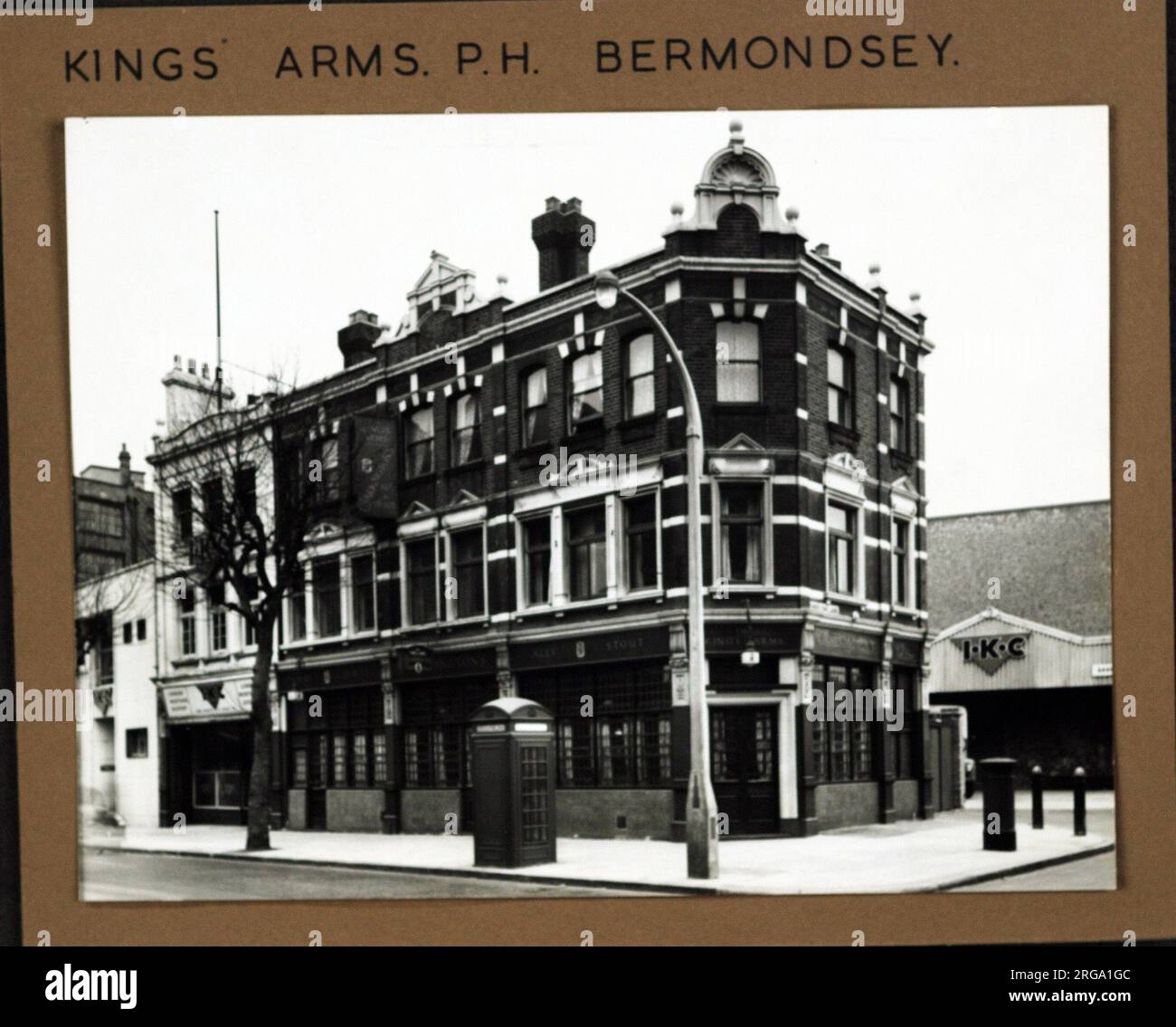 Photograph of Kings Arms, Bermondsey, London. The main side of the print (shown here) depicts: Right face on view of the pub.  The back of the print (available on request) details: Trading Record 1938 . 1961 for the Kings Arms, Bermondsey, London SE1 2JX. As of July 2018 . Greene King Stock Photo