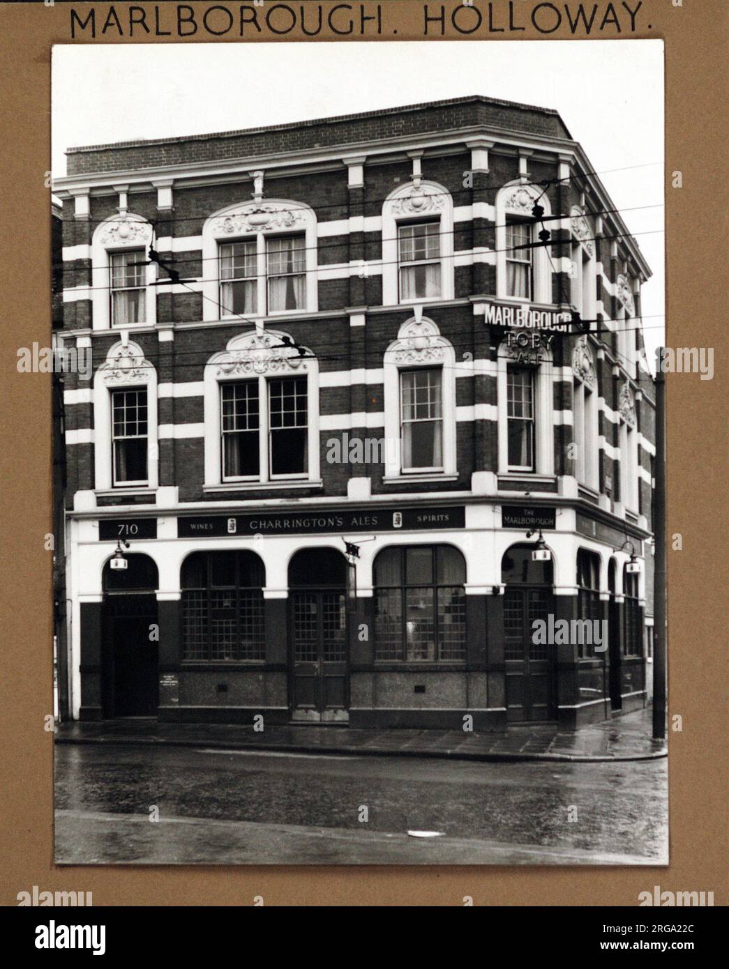 Photograph of Marlborough PH, Upper Holloway, London. The main side of the print (shown here) depicts: Face on view of the pub.  The back of the print (available on request) details: Nothing for the Marlborough, Upper Holloway, London N19 3NH. As of July 2018 . Renamed Angies then closed. Became The Spoke Coffee Shop, bottled beers only. Stock Photo