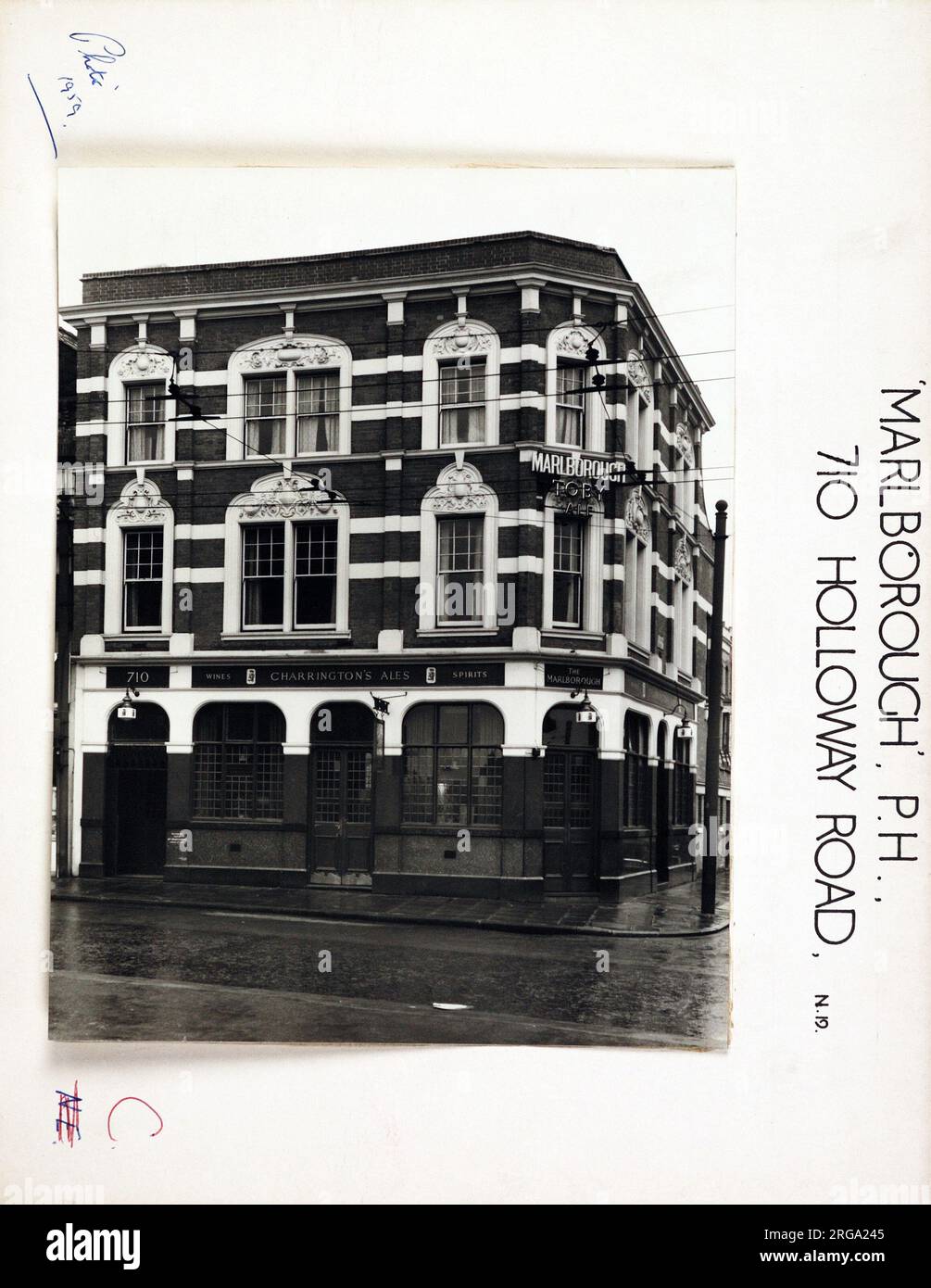 Photograph of Marlborough PH, Upper Holloway, London. The main side of the print (shown here) depicts: Face on view of the pub.  The back of the print (available on request) details: Trading Record 1957 . 1961 for the Marlborough, Upper Holloway, London N19 3NH. As of July 2018 . Renamed Angies then closed. Became The Spoke Coffee Shop, bottled beers only. Stock Photo
