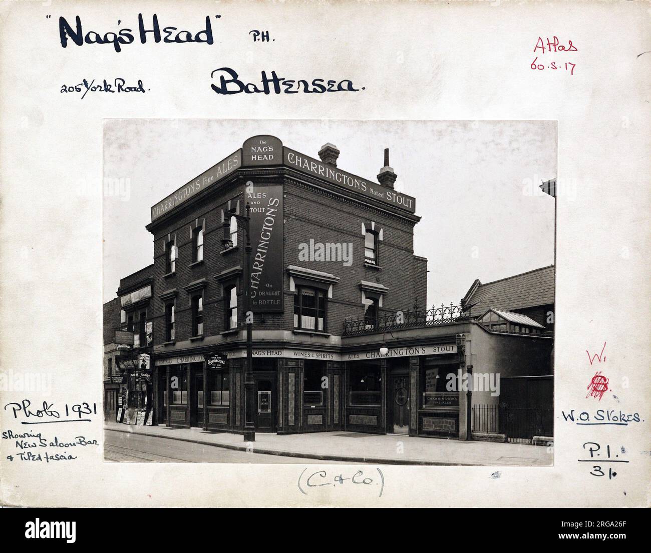 Photograph of Nags Head PH, Battersea, London. The main side of the print (shown here) depicts: Corner on view of the pub.  The back of the print (available on request) details: Trading Record 1924 . 1961 for the Nags Head, Battersea, London SW11 3QT. As of July 2018 . Demolished Stock Photo