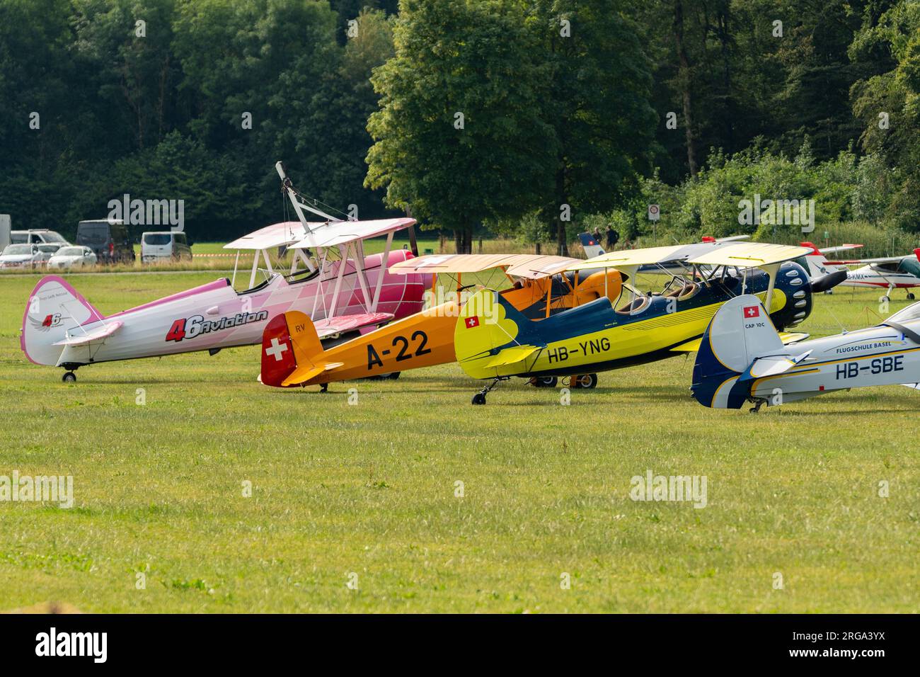 Speck-Fehraltorf, Zurich, Switzerland, July 1, 2023 Different acrobatic aircraft are parking on the grass field Stock Photo