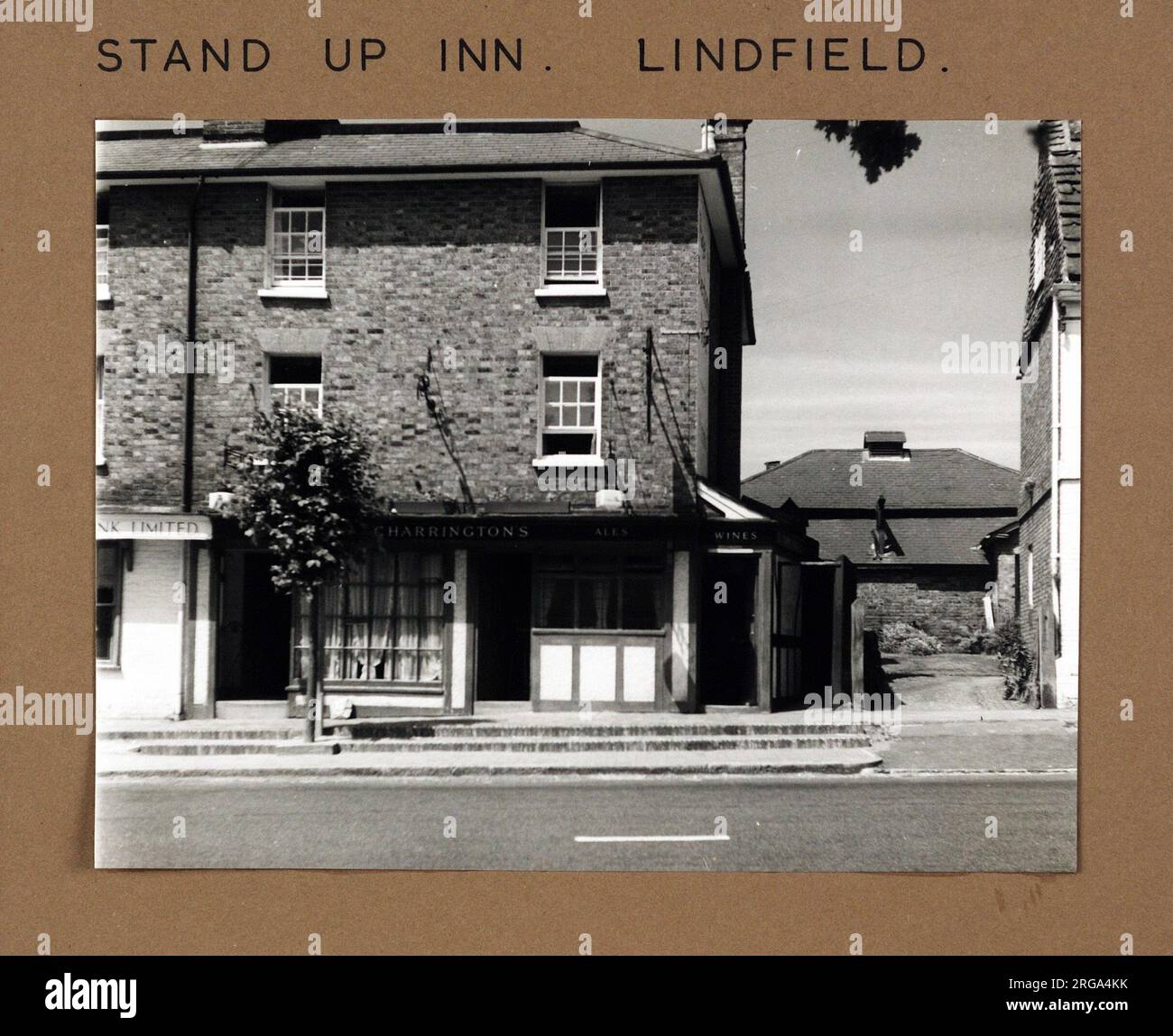 Photograph of Stand Up Inn, Lindfield, Sussex. The main side of the print (shown here) depicts: Face on view of the pub.  The back of the print (available on request) details: Nothing for the Stand Up Inn, Lindfield, Sussex RH16 2HN. As of July 2018 . Indigo Pub Co Stock Photo