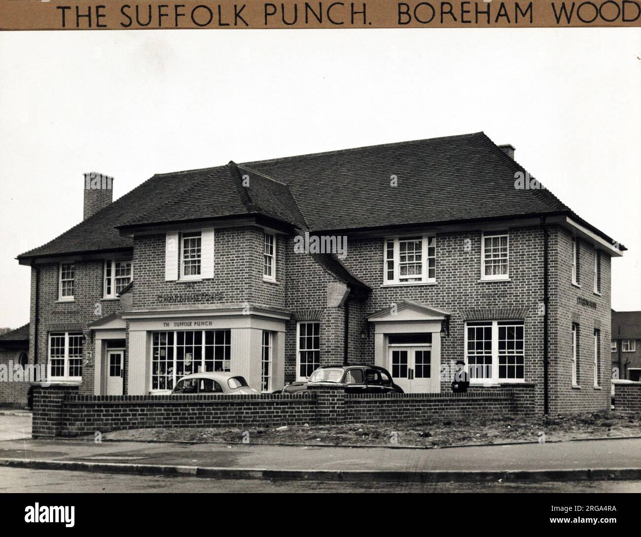 Photograph of Suffolk Punch PH, Borehamwood, Hertfordshire. The main side of the print (shown here) depicts: Right face on view of the pub.  The back of the print (available on request) details: Nothing for the Suffolk Punch, Borehamwood, Hertfordshire WD6 2PA. As of July 2018 . Renamed Willow Tree now flats Stock Photo