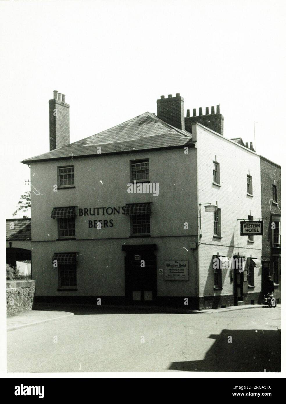Photograph of Western Hotel, Axminster, Somerset. The main side of the print (shown here) depicts: Corner on view of the pub.  The back of the print (available on request) details: Publican ID for the Western Hotel, Axminster, Somerset EX13 5NU. As of July 2018 . Now Le Pisani restaurant Stock Photo