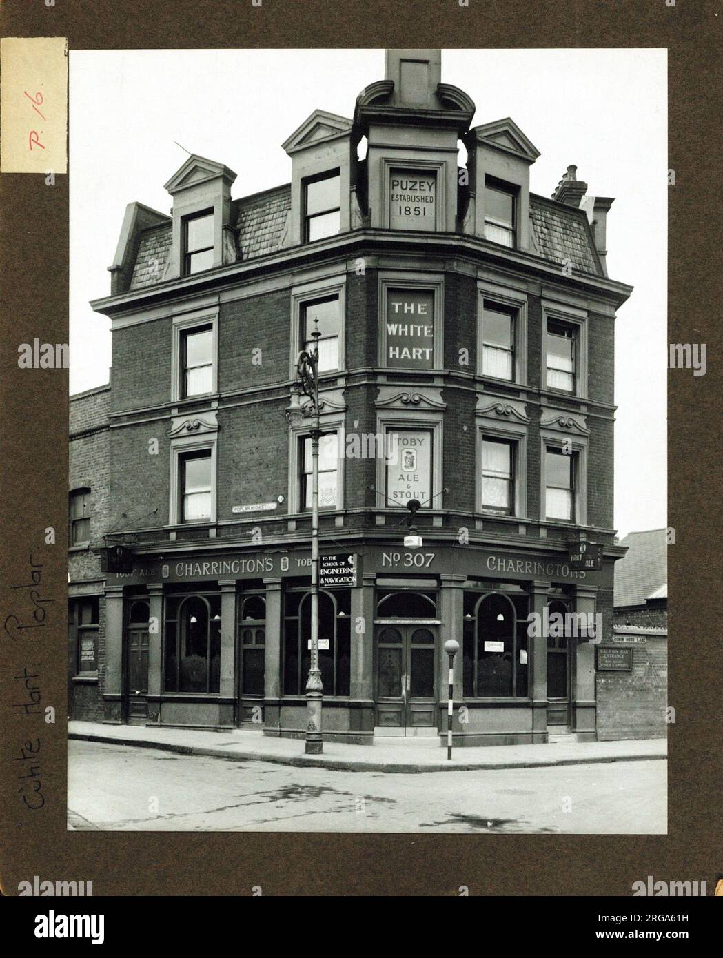 Photograph of White Hart PH, Poplar, London. The main side of the print (shown here) depicts: Corner on view of the pub.  The back of the print (available on request) details: Nothing for the White Hart, Poplar, London E14 0HG. As of July 2018 . Demolished Stock Photo