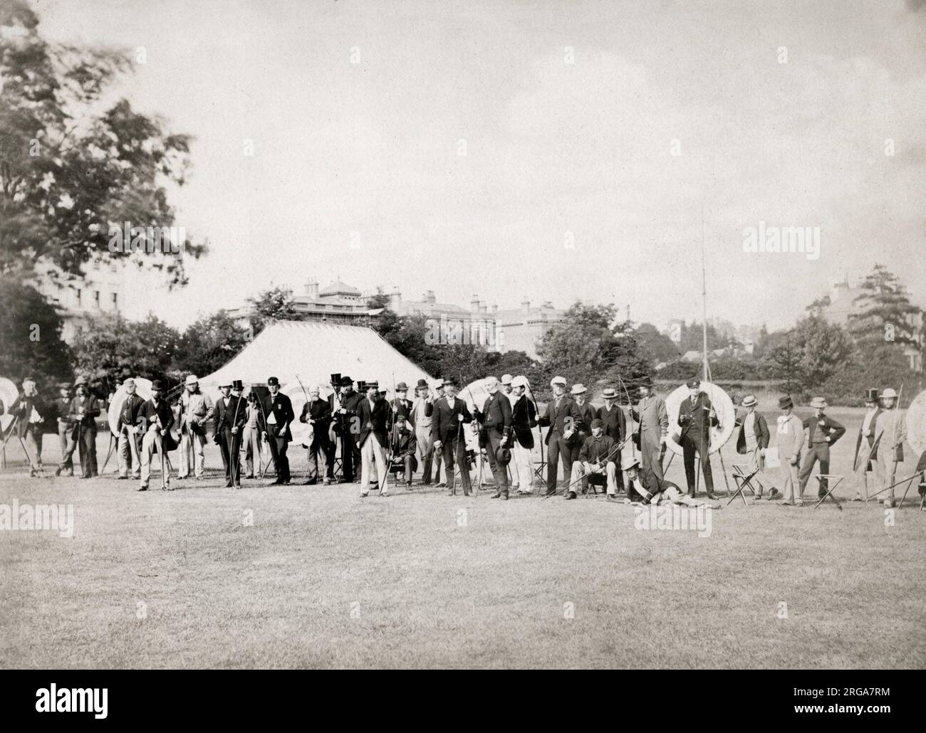Vintage 19th century photograph: Very early image of an archery competition, competitors with bows and arrows, Leamington Spa, 1870 Stock Photo