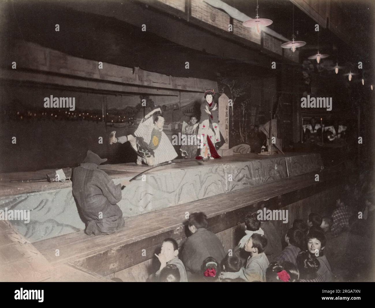 Crowd watching a theatrical performance, Japan. Vintage 19th century photograph. Stock Photo