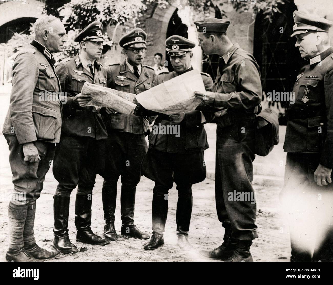 World War II - German Major Geneeral Eric Estler discusses surrender terms with American Lt. Colonel French, Loire Valley France. Stock Photo