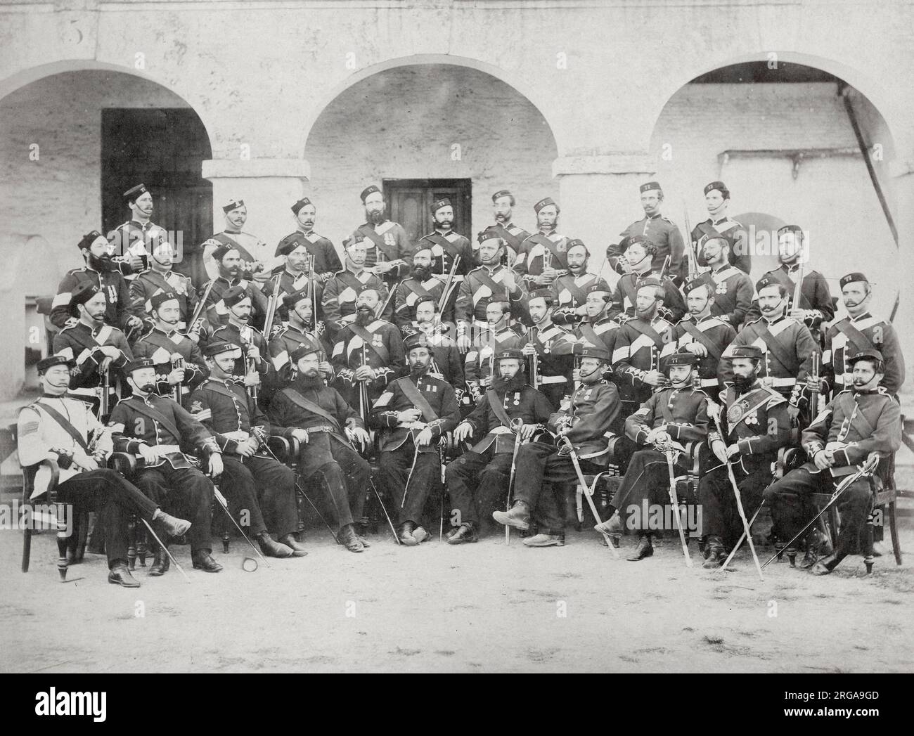 Vintage 19th century photograph - British army in India - NCOs of the 77th Regiment 1870 Stock Photo