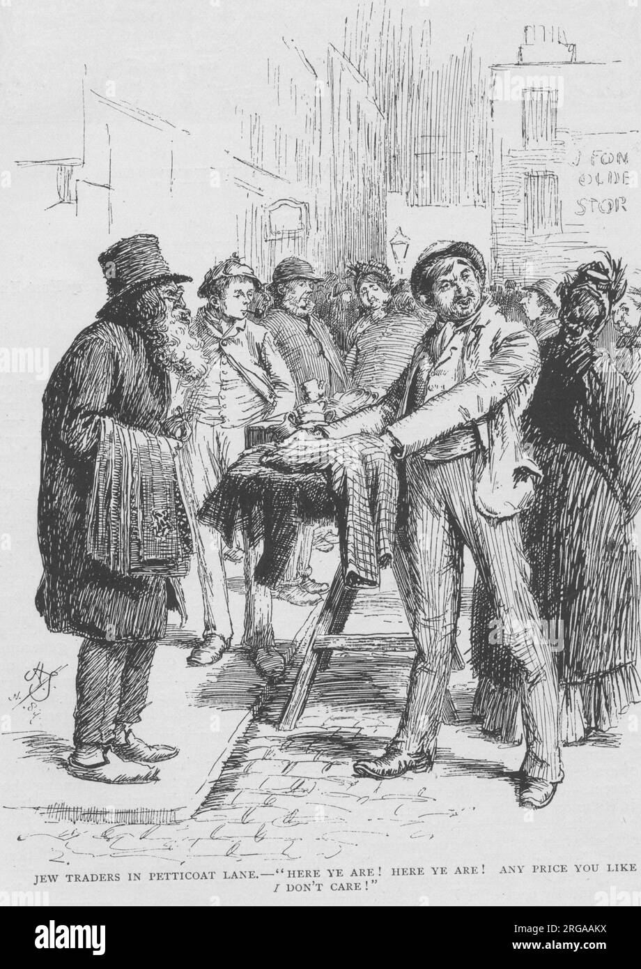 Jewish traders in Petticoat Lane (Middlesex Street) in the East End of London. 'Here ye are! Here ye are! Any price you like, I don't care!' Stock Photo