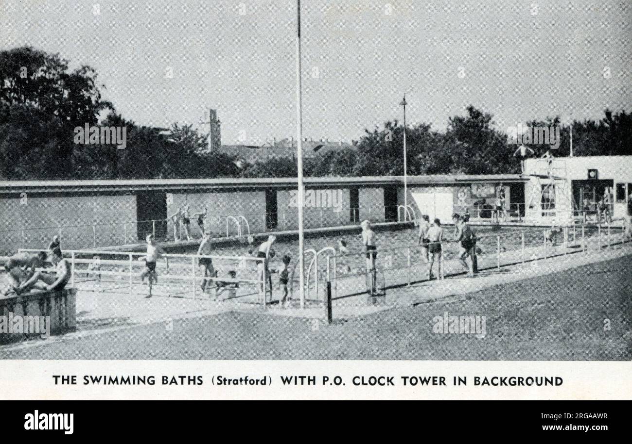 Stratford, New Zealand - The Swimming Baths (Stratford) with Post Office Clock Tower in background. Stock Photo