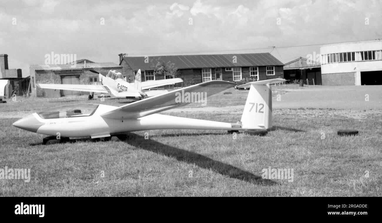Schleicher ASW19B '712' at the London Gliding Club, on Dunstable Downs, with DHC-1 Chipmunk G-AOTR, outside the award-winning clubhouse / hangar. Stock Photo