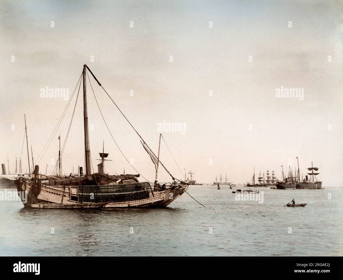 Vintage 19th century photograph - ships in a Japanese harbour including a traditional junk Stock Photo
