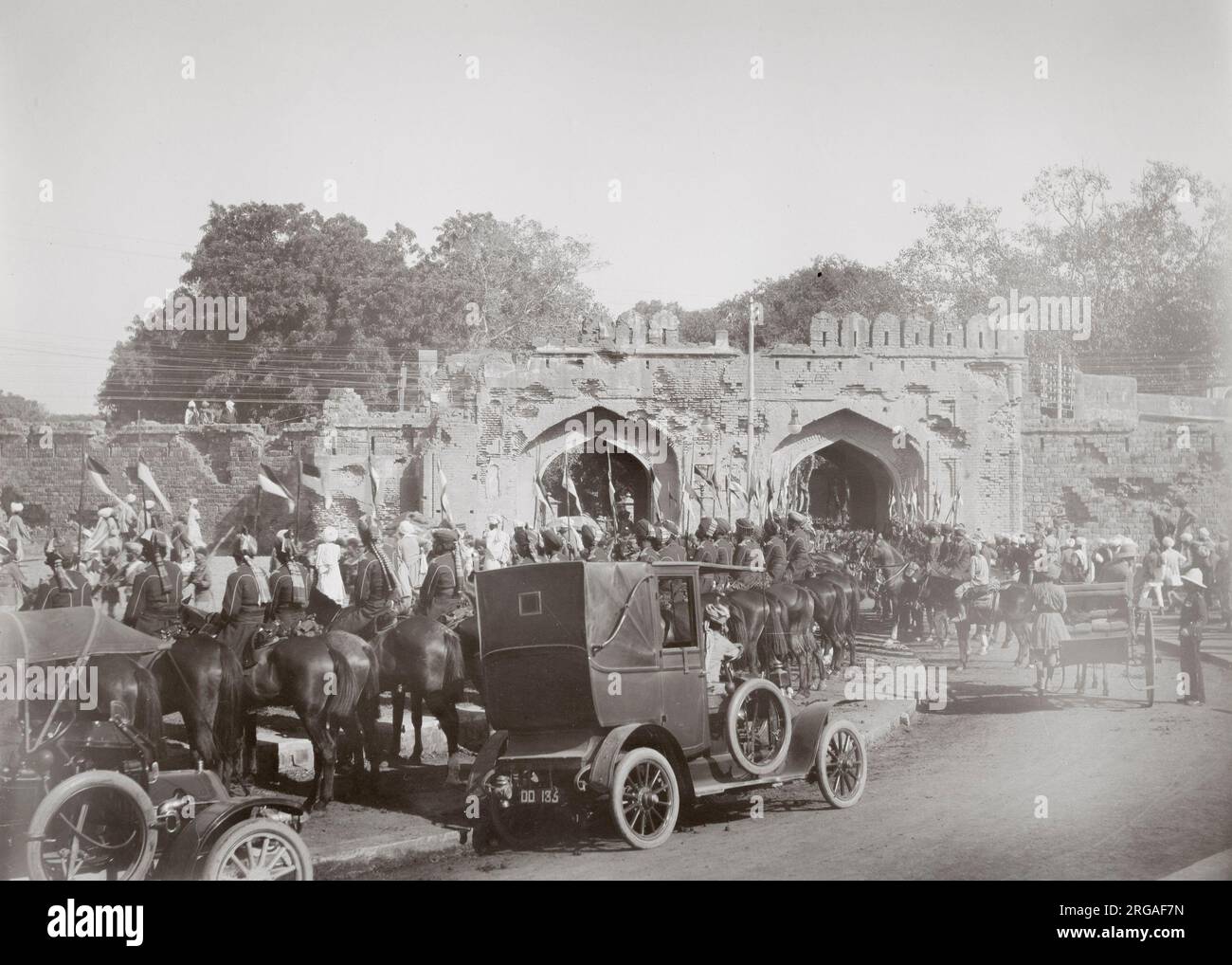 Delhi at the time of the Delhi Durbar, probably 1911, though very similar to the 1903 event. Early motor cars and cavalry at the Cashemre, Kashmir Gate. Stock Photo