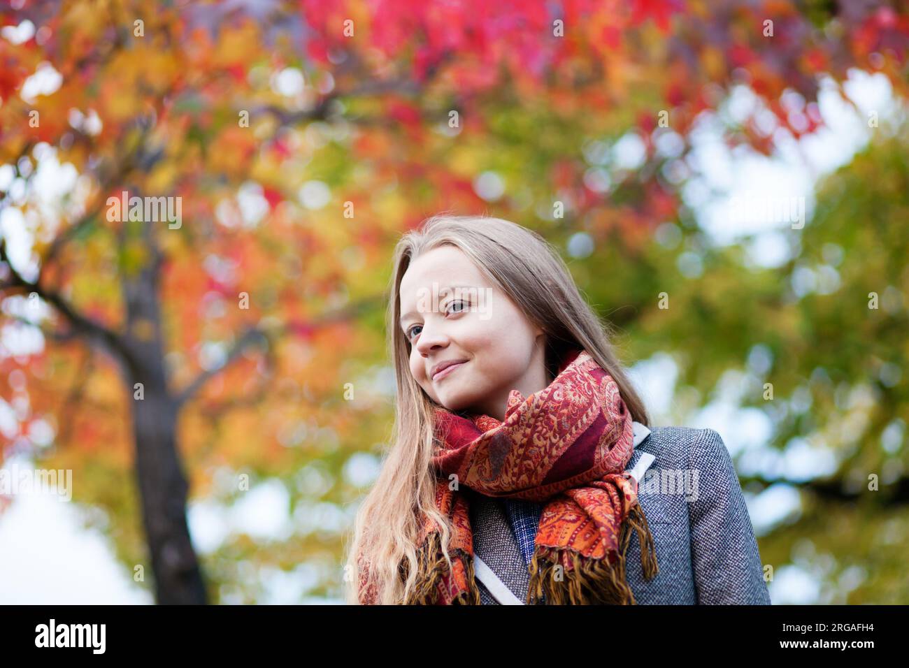Outdoor autumn portrait of a beautiful blond girl Stock Photo - Alamy