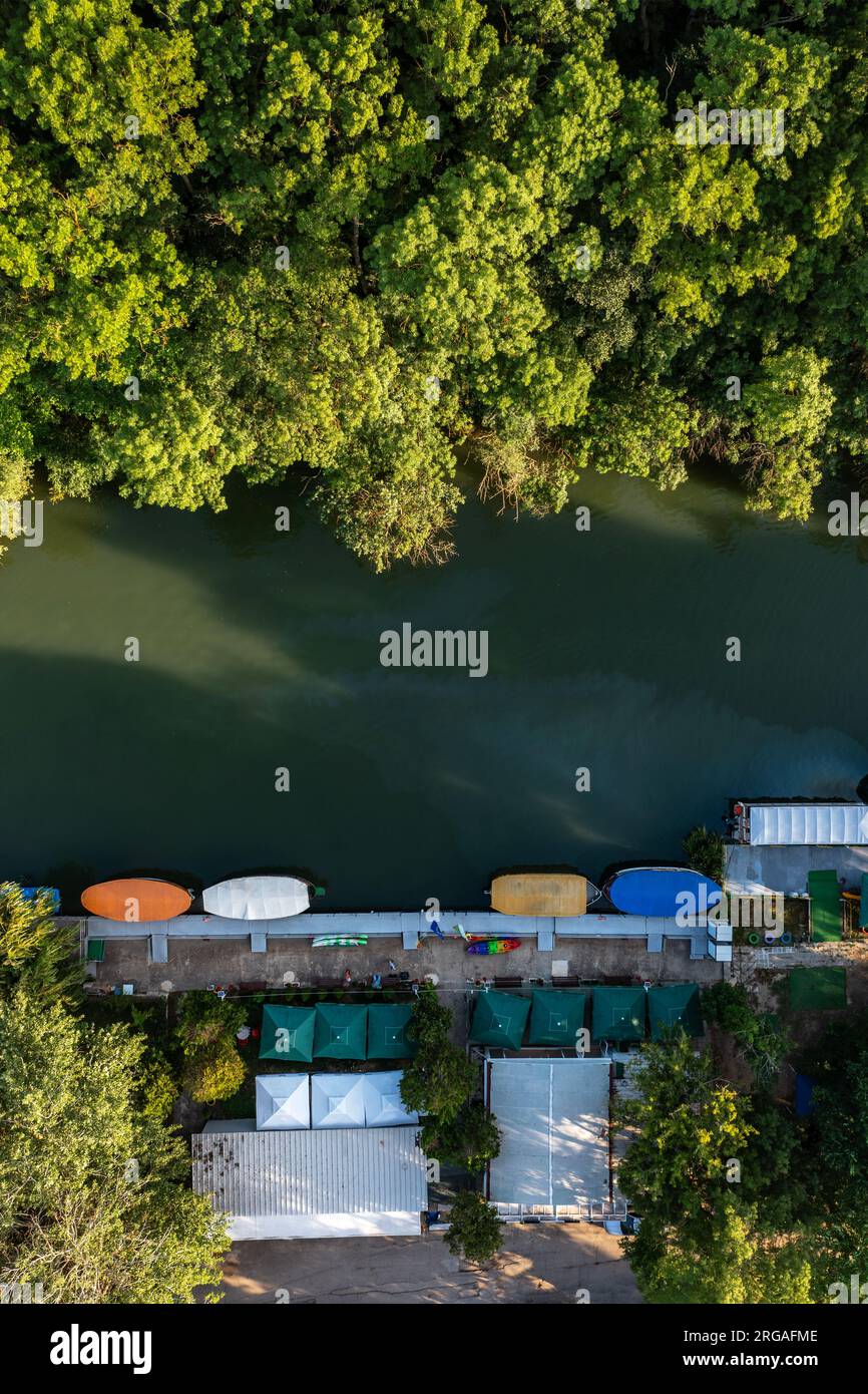 Aerial view to a boat in river Stock Photo - Alamy