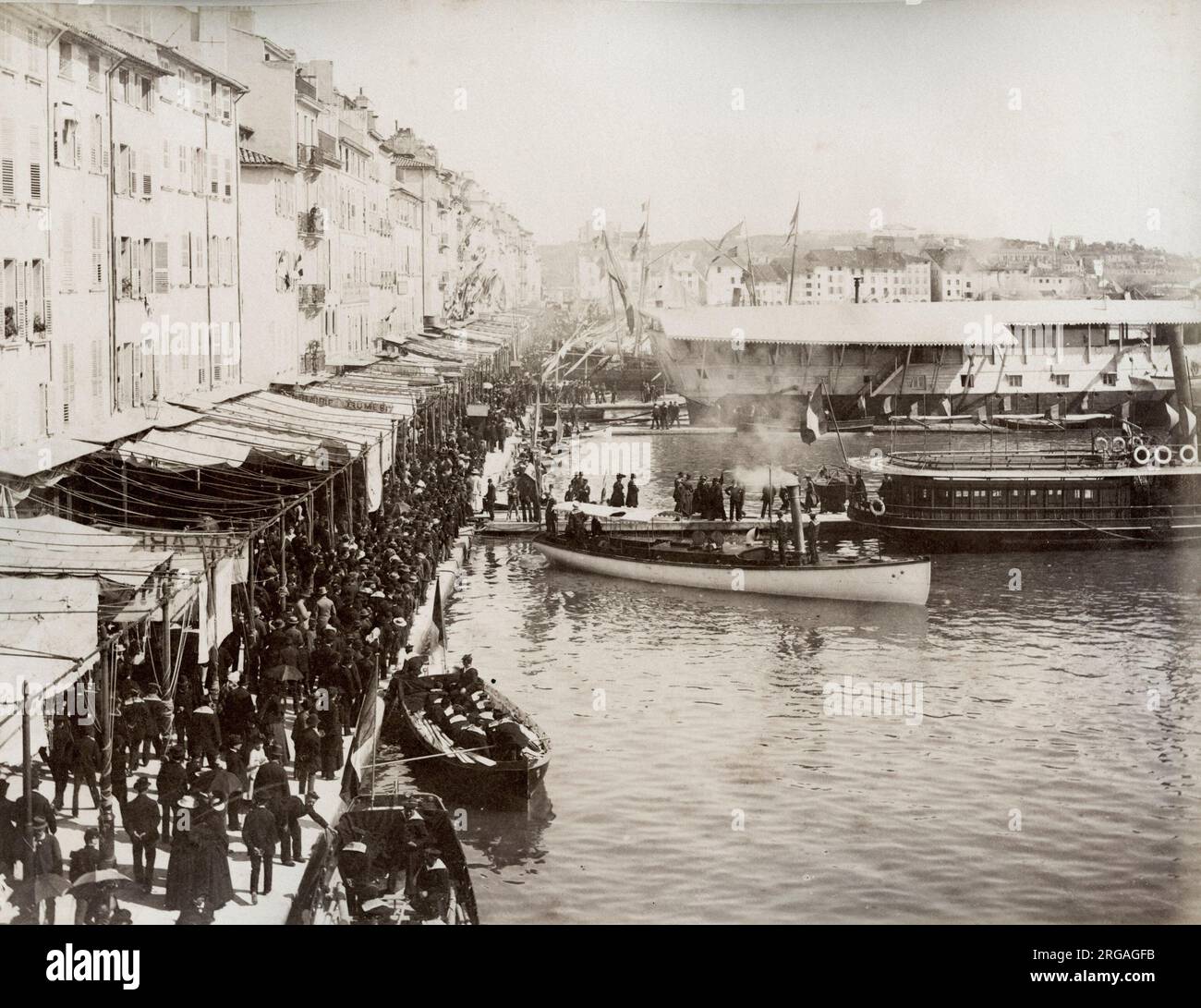 Vintage 19th century photograph - city wharf, busy with boats, probably France or Italy. Stock Photo