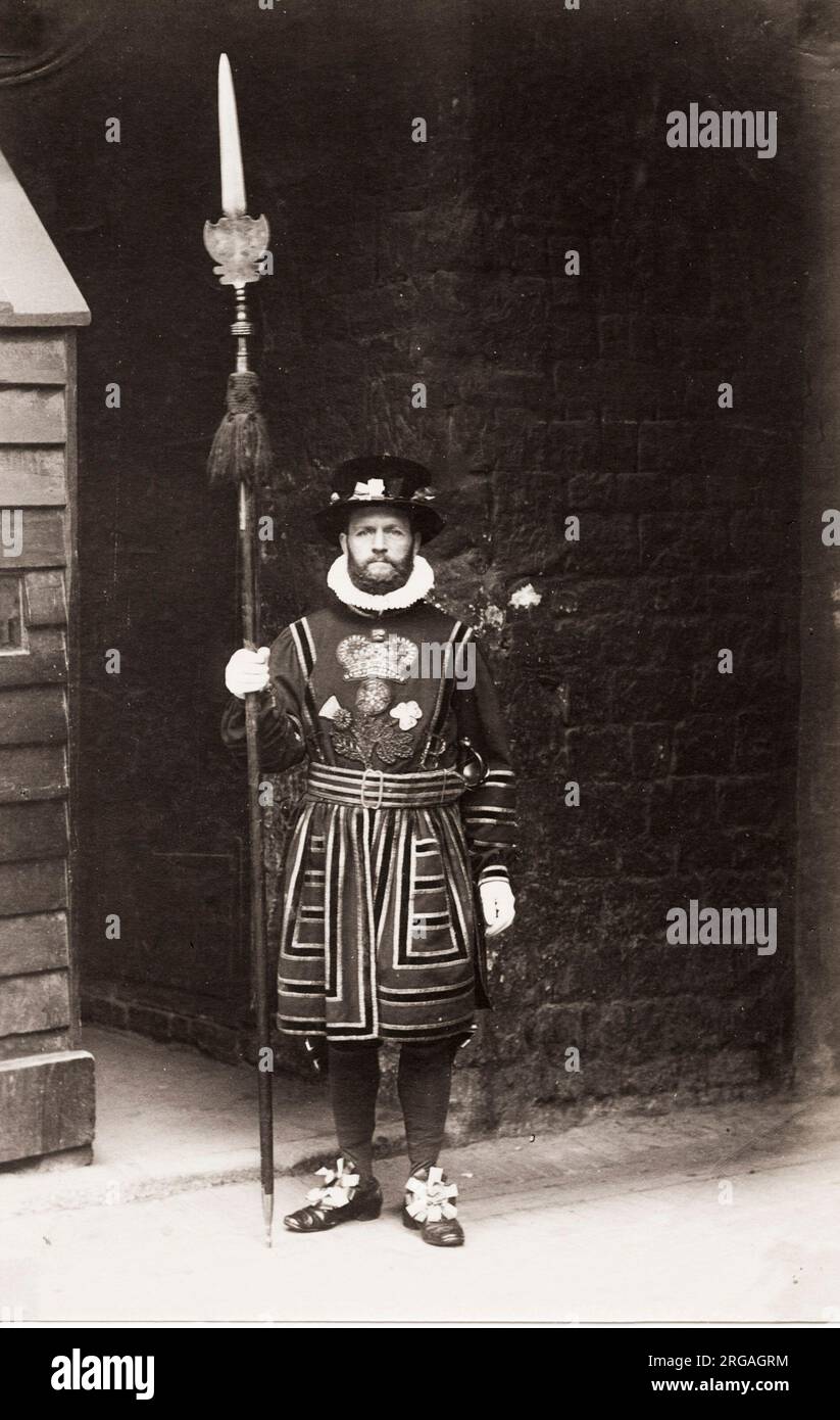 19th century vintage photograph: London Beefeater, cermonial guard, uniform and staff. Stock Photo