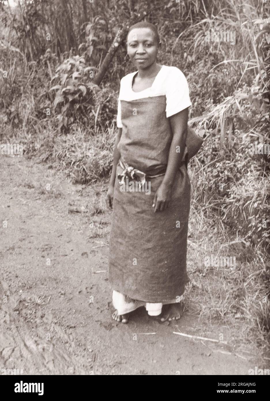 1940s East Africa - Uganda - Baganda woman in a traditional bark cloth or barkcloth dress Photograph by a British army recruitment officer stationed in East Africa and the Middle East during World War II Stock Photo