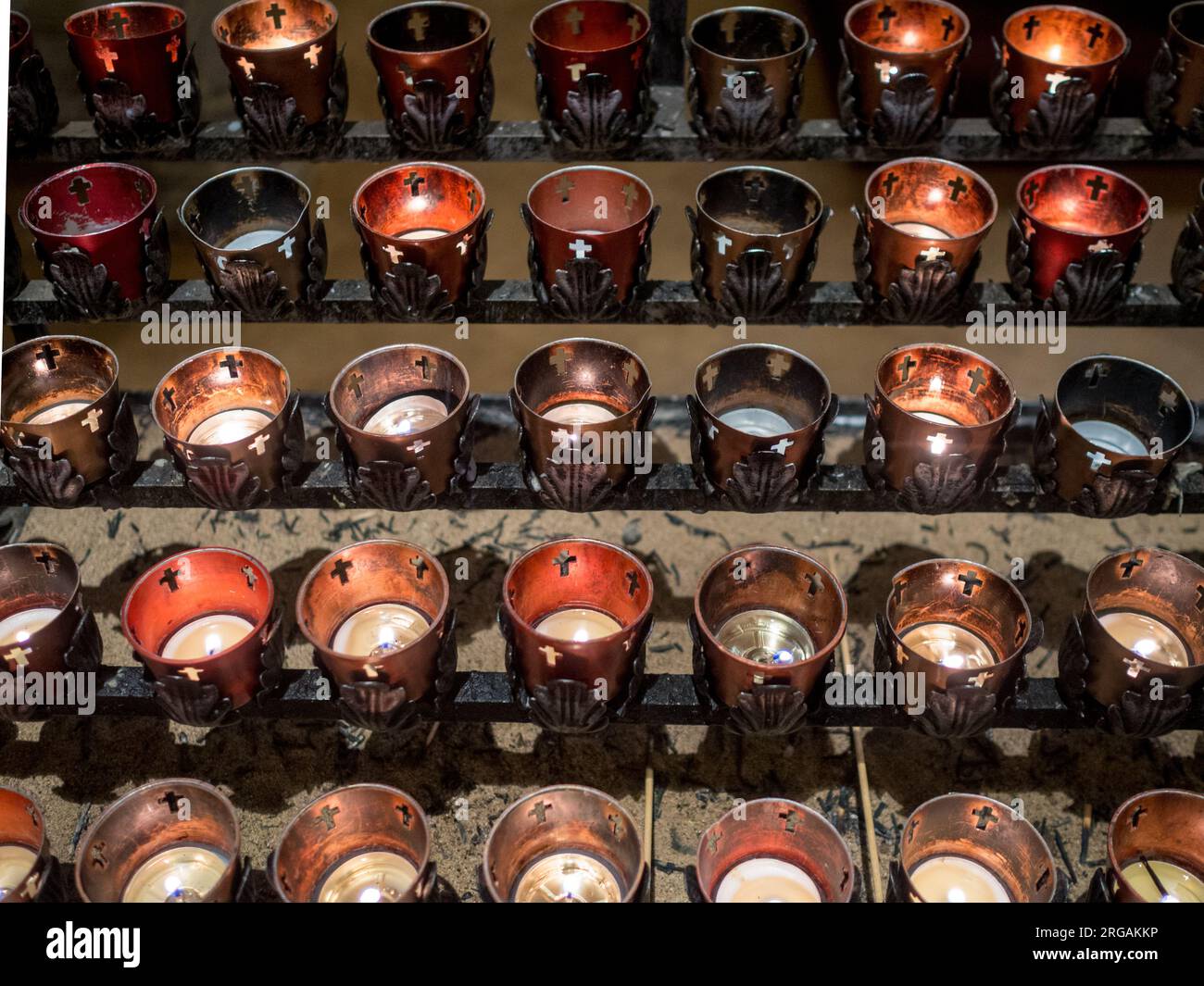 Prayer candles at the San Miguel Catholic Church in Santa Fe, NM Stock Photo