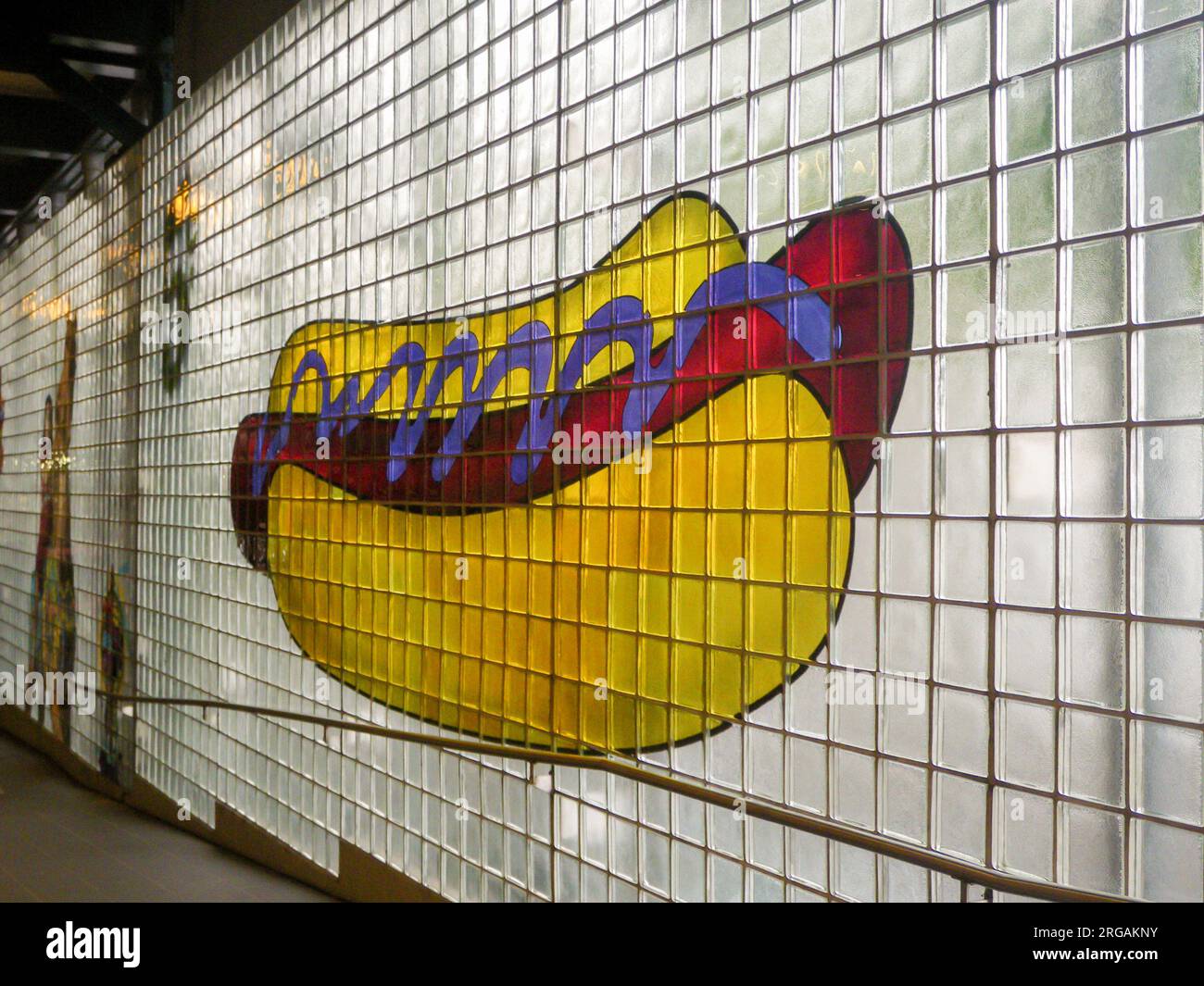 A painted hot dog graces the glass block wall at the Coney Island