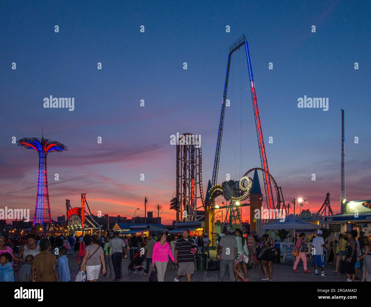 Rides at Coney Island in New York at dusk Stock Photo