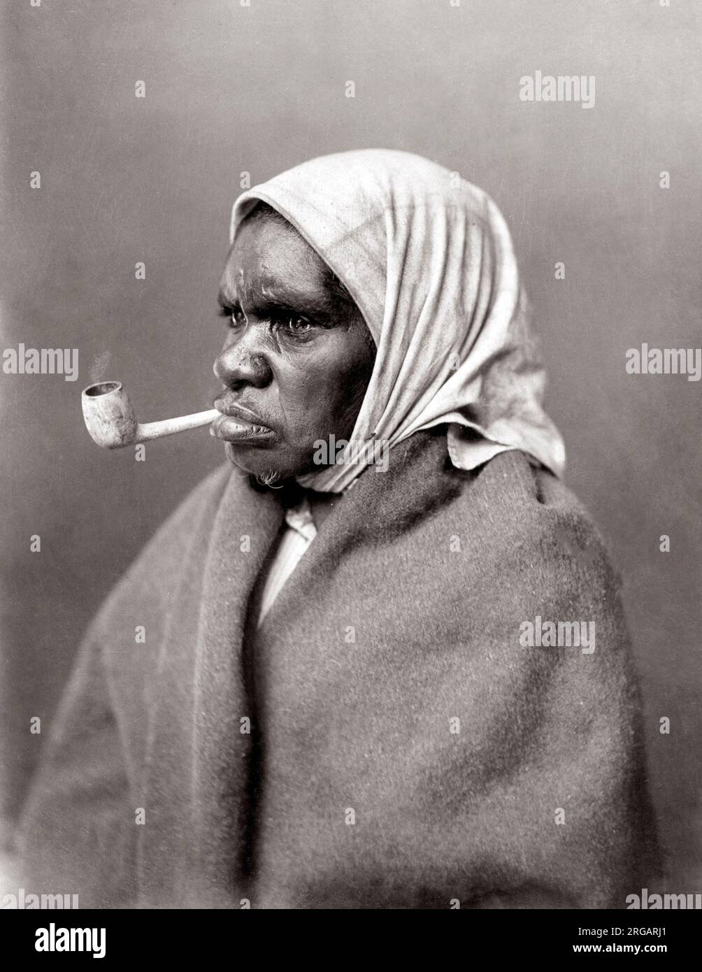 Aboriginal woman smoking a pipe, Australia, c.1890 Stock Photo Alamy