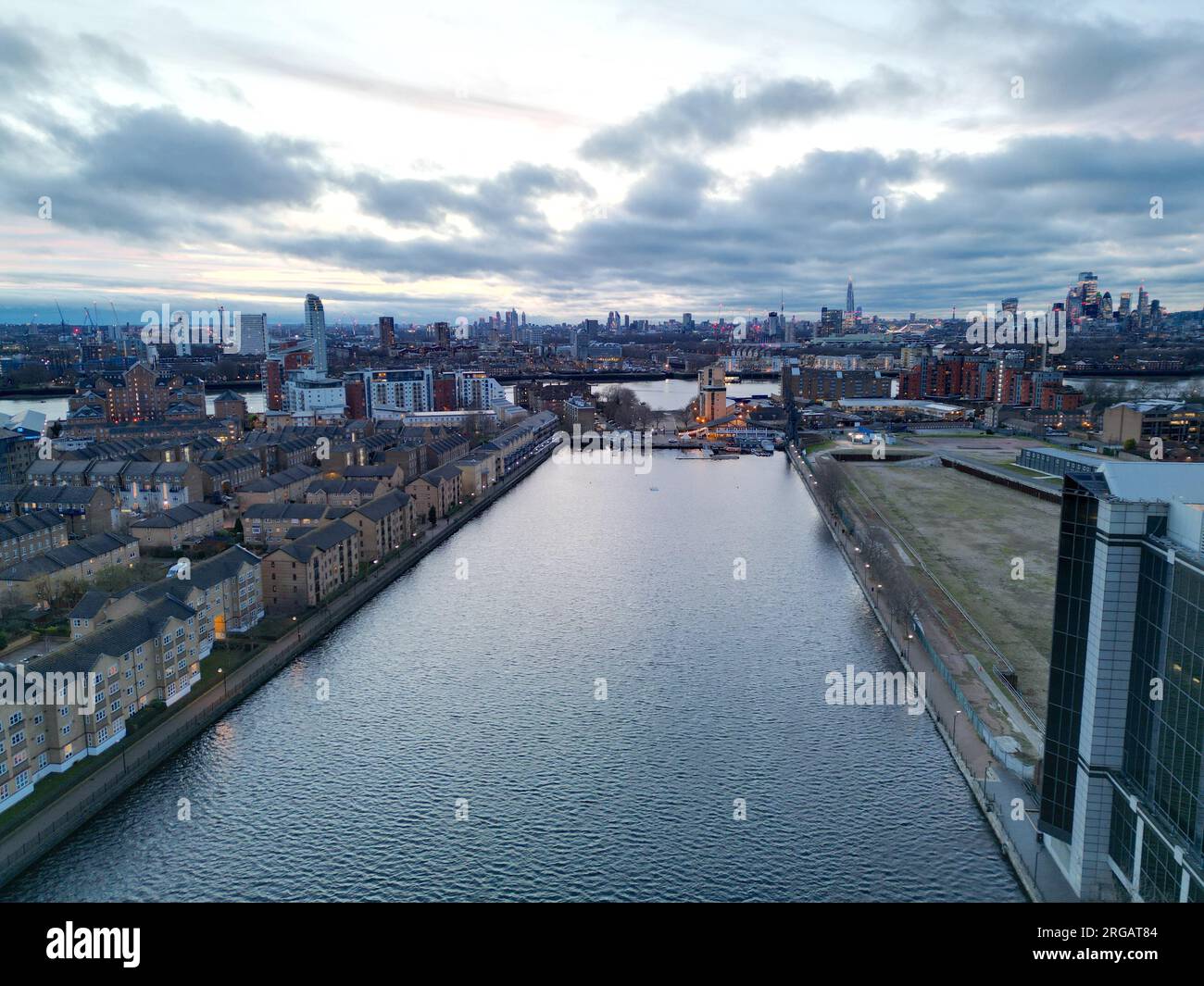 Millwall dock Evening view Canary Wharf financial district London UK  aerial Stock Photo