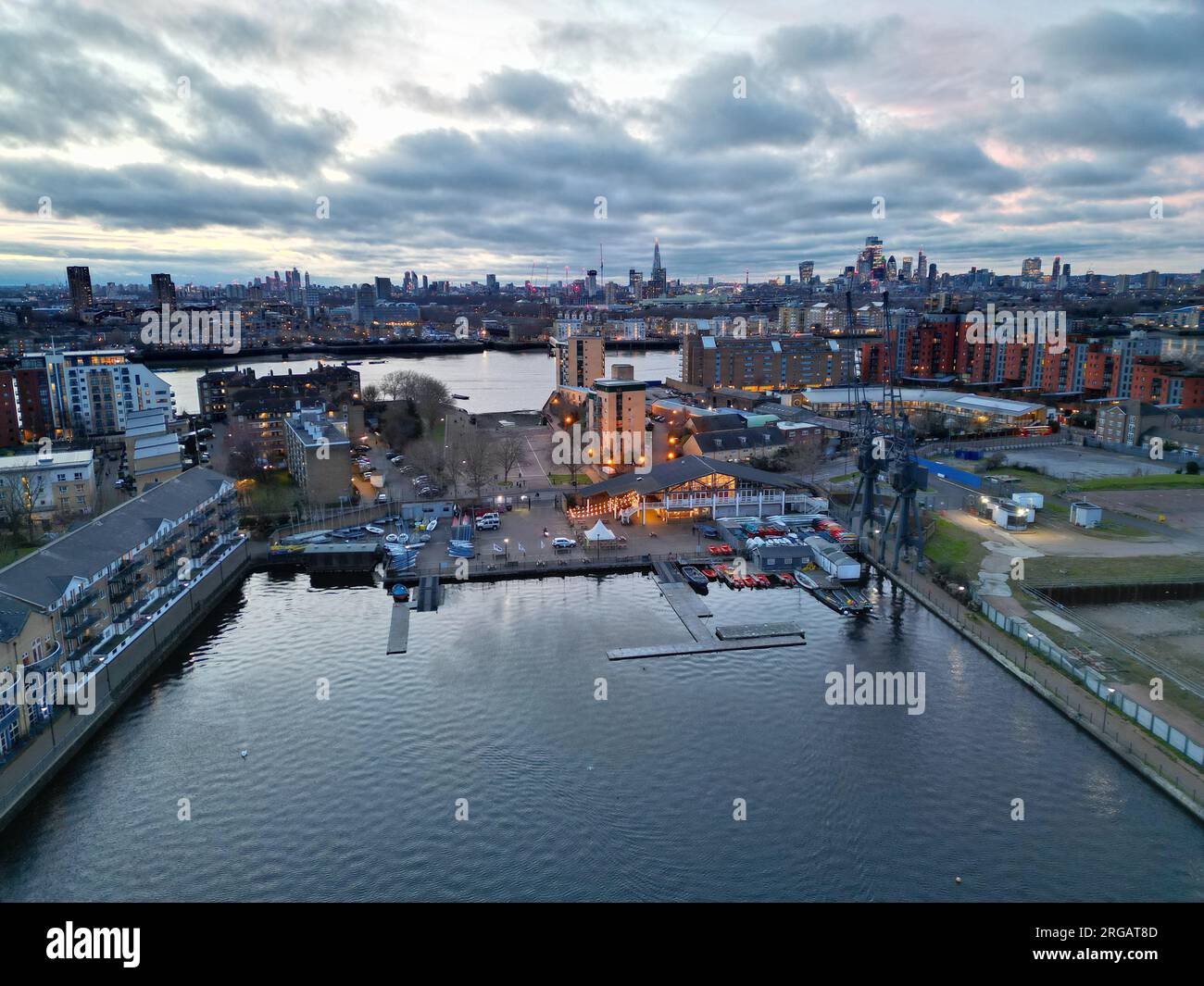 Millwall dock Evening view Canary Wharf financial district London UK  aerial Stock Photo