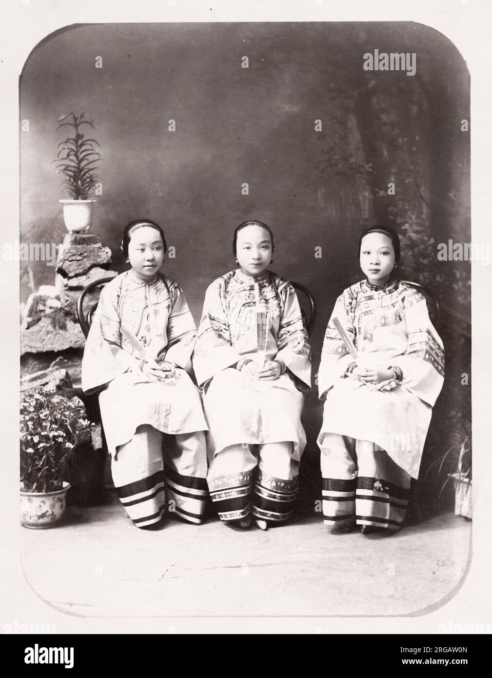 Vintage late 19th century photograph: Three Chinese women with bound feet, China. Stock Photo