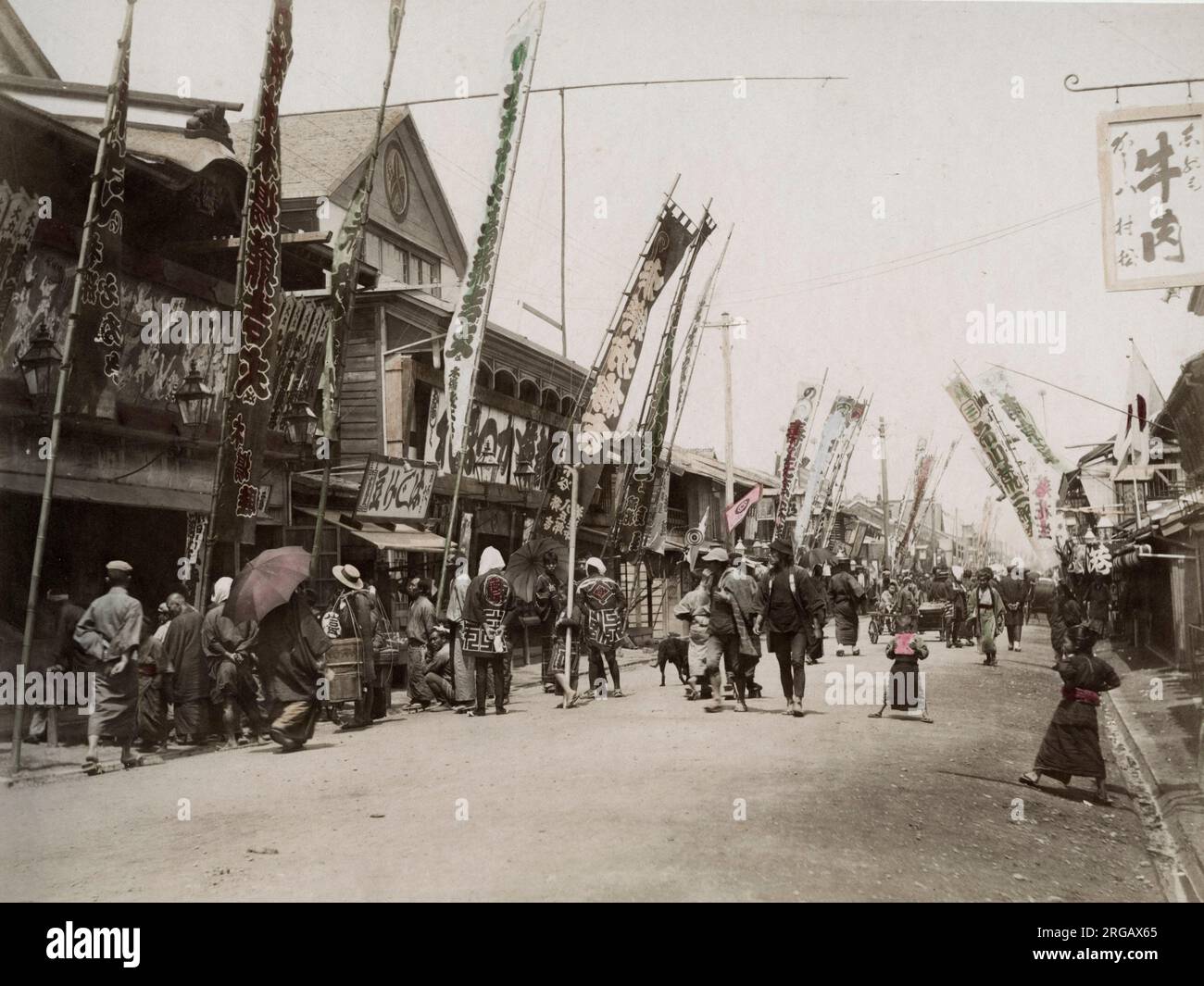 19th century vintage photograph - Isezakicho, Yokohama, Japan. Now a high-energy shopping district Isezakicho centers on Isezaki Mall, an outdoor pedestrian arcade with mainstream boutiques and department stores. Image c.1880's. Stock Photo