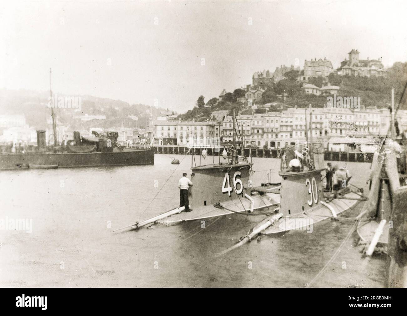 Vintage early 20th century photograph: Torquay harbour, early submarines. Stock Photo