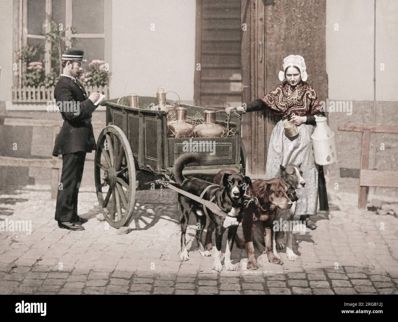 19th century vintage photograph: milk maid and dog milk cart Belgium. Stock Photo