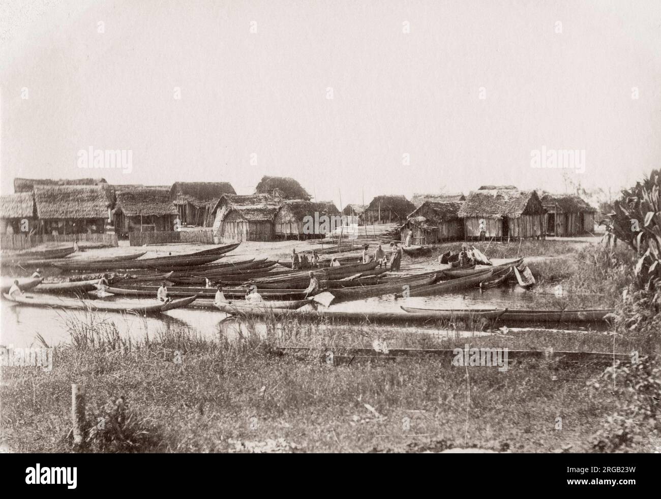 Vintage 19th century photograph: canoes and river bank at Ivondro, Madagascar. Stock Photo