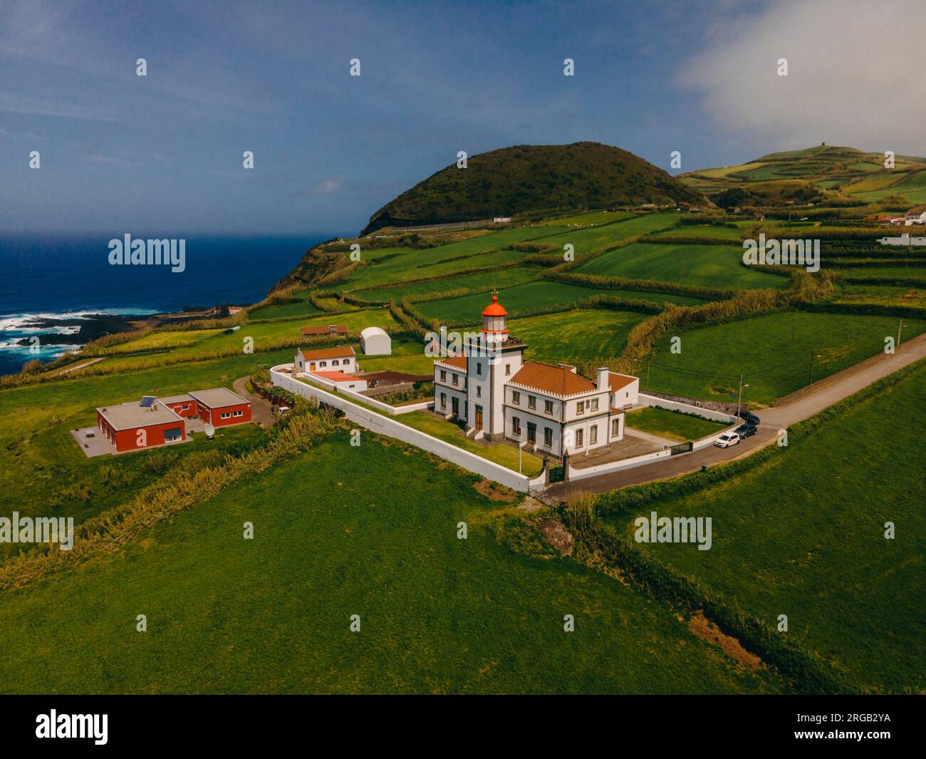 20.4.2024 Sao Miguel, Azores, Portugal. Farol da Ferraria is a majestic lighthouse on Sao Miguel Island, Azores, guiding ships with its radiant beam Stock Photo