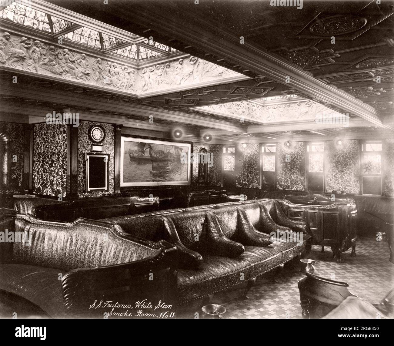 1889 photograph - RMS Teutonic - from an album of images relating to the launch of the vessel, which was built by Harland and Wolff in Belfast, for the White Star Line - later to achieve notoriety as the owner of the Titanic. The album shows interiors of the ship, member of the crew, trial cruises, including a visit onboard by the German Kaiser and Prince of Wales, as well as many images of other visitors. Stock Photo
