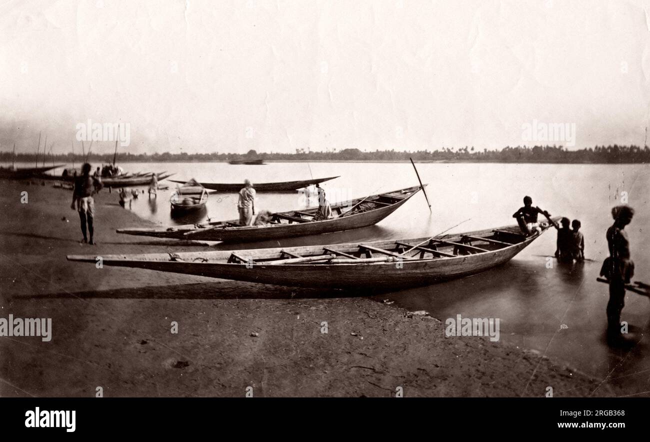 Fishing boats, canoes, river bank, India, c.1880's Stock Photo