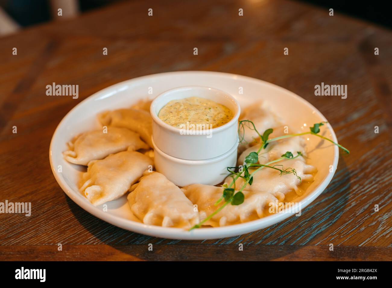 Pierogi is a traditional Eastern European, mainly Polish dumplings, filled with various ingredients, a beloved comfort food with endless flavor Stock Photo