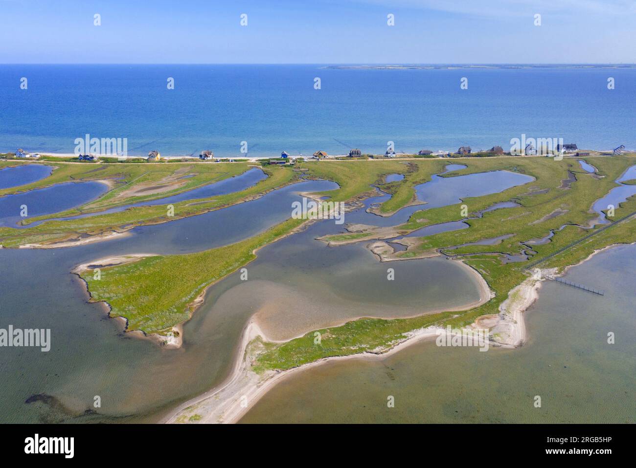 Aerial view over houses on the shore along the Baltic Sea coast at Steinwarder peninsula, Heiligenhafen, Ostholstein, Schleswig-Holstein, Germany Stock Photo